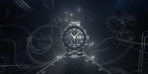 Une montre élégante en acier inoxydable avec un cadran et un bracelet noirs, reposant sur un fond noir uni.